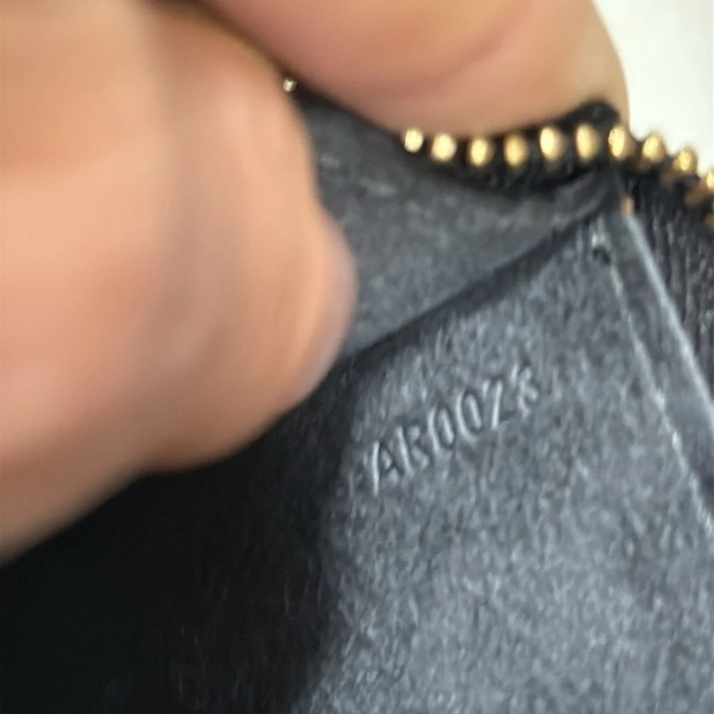 Louis Vuitton Pochette Black EPI Leather Clutch